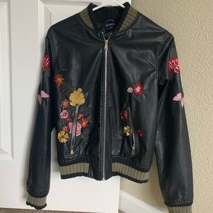 Black bomber with floral detail